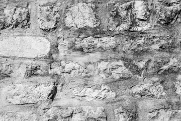Backdrop from old stones masonry. Natural stone wall textured background for a poster, calendar, screensaver, wallpaper, postcard, banner, cover, website. High quality photography