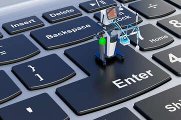 Fototapeta premium Medical ventilator on laptop keyboard, 3D rendering