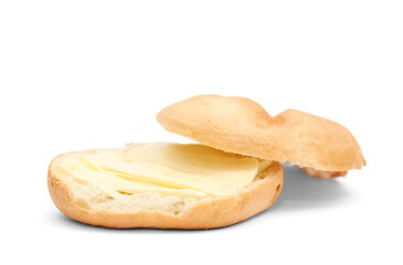 Delicious kaiser roll with butter on white background