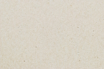 A sheet of beige recycled cardboard texture as background
