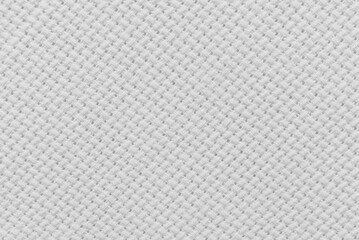 Fototapeta premium White canvas fabric for background, a surface of a white cross-stitch canvas as background