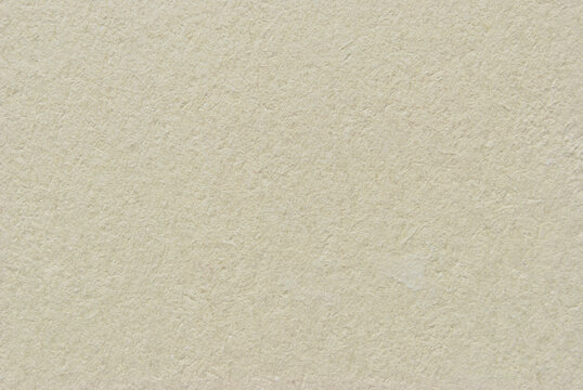 A sheet of rough recycled paper texture as background
