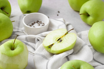 Ripe juicy apples on light table, closeup