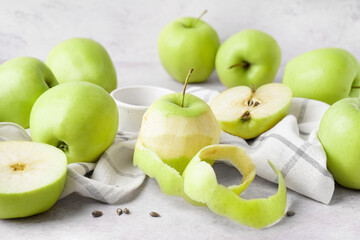 Ripe juicy apples on light table