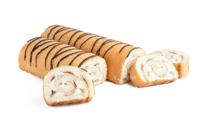 Cut sponge cake rolls on white background