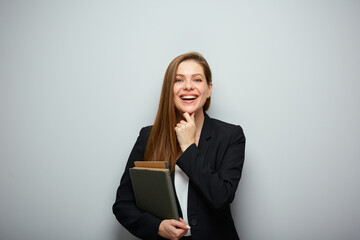 Smiling woman teacher or student holding workbook. Isolated portrait with copy space.