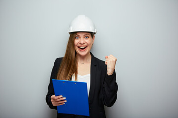 Successful business woman architect or engineer profession holding blue tablet.