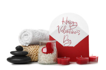 Letter with text HAPPY VALENTINE'S DAY and spa supplies on white background