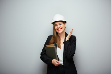 Woman student architect or engineer profession standing with book.