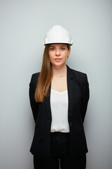 Serious woman engineer or architect in black suit. Isolated female portrait.