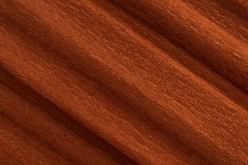 Naklejka premium Textured background of brown crepe paper for crafts. Corrugated paper with a large background