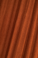 Textured background of brown crepe paper for crafts. Corrugated paper with a large background