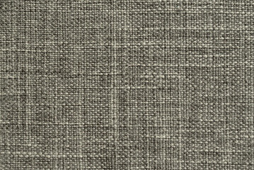 Fototapeta na wymiar Basic background of linen fabric, close-up of fabric fibers