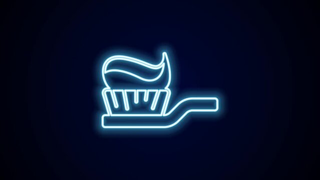 Glowing neon line Toothbrush with toothpaste icon isolated on black background. 4K Video motion graphic animation