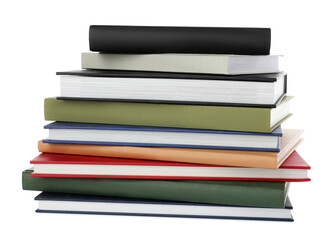 Many different books stacked on white background