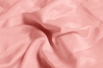 Fototapeta premium Pink shiny fabric as background, closeup view