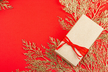 Christmas festive gift box, surprise concept. New Year background in red and gold colors