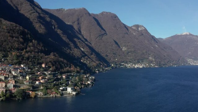 The Italian villages of Laglio and Torriggia on Lake Como from the sky during a sunny December day. 4k, dlog, 100 Mbits.
I paesi italiani di Laglio e Torriggia sul lago di Como a dicembre.