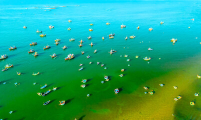 Mui Ne fishing village seen from above with hundreds of boats anchored to avoid storms, this is a beautiful bay in central Vietnam