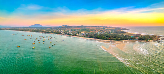 Aerial view of sea Mui Ne, Vietnam see the whole bay of Ke Ga from north to south bank shore very large with sea waves, ships, reefs is tourism potential Status of Vietnam.