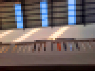 Abstract pixel background with blue and black at the top, while at the bottom is dominated by white.