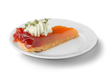 A slice of Pumpkin Cheesecake Pie with whipped cream,