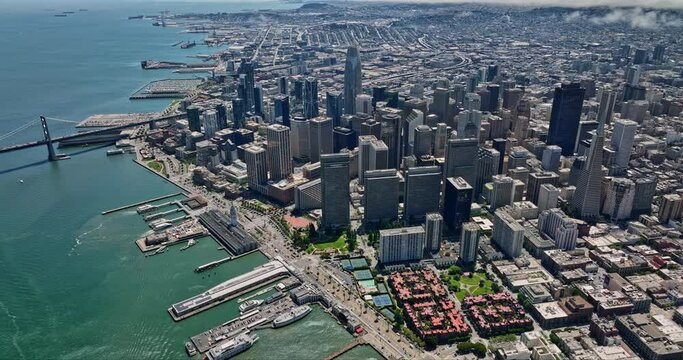 San Francisco California Aerial v107 futuristic birds eye view of waterfront bay area and downtown cityscape with high density of skyscrapers in financial district - Shot with Mavic 3 Cine - May 2022