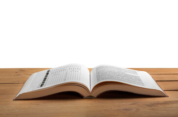 Open reading book on a wooden desk