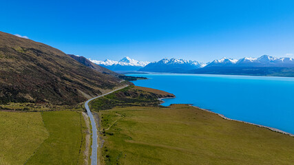 Fototapeta na wymiar Aerial view of Landscape view of mountain range near Aoraki Mount Cook and the road leading to Mount Cook Village in New zealand