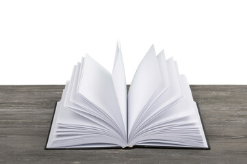 Open book on wooden desk. Education concept