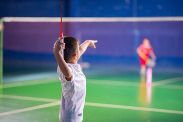 Boys training badminton indoor  activitiy - 555584265