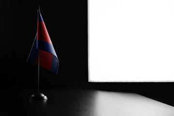 Small national flag of the Cambodia on a black background