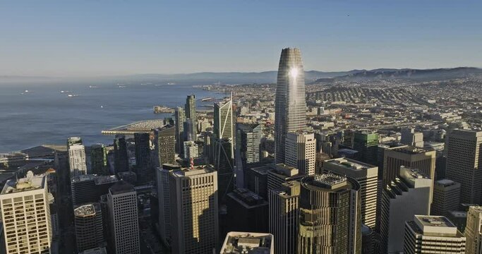 San Francisco California Aerial v160 circular panning capturing downtown cityscape filled with high rise buildings and skyscrapers in financial district by the bay - Shot with Mavic 3 Cine - June 2022