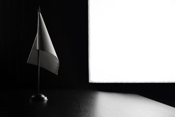 Small national flag of the Cyprus on a black background