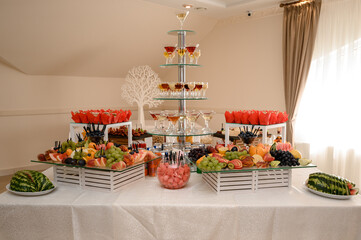 Festive table set with food and drinks.