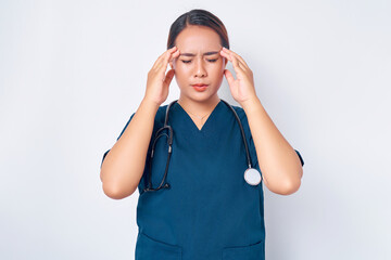 Tired young Asian woman nurse wearing blue uniform with a stethoscope feeling sick and touching her...
