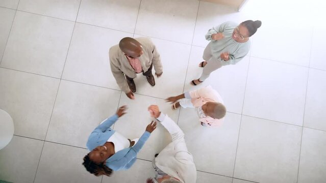 Top view, team and hands stack for goal, achievement and target in office. Celebration, staff and business for sales growth, marketing agency and group project for campaign, teamwork or collaboration
