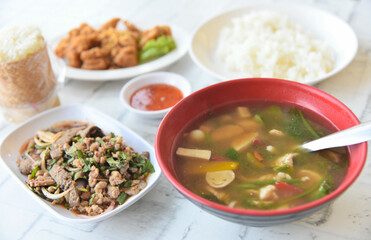 Northeastern Thai  cuisine, Roasted pork liver spicy salad, Deep fried chicken tendons with sweet sauce, Thai spicy soup with herbs and sticky rice