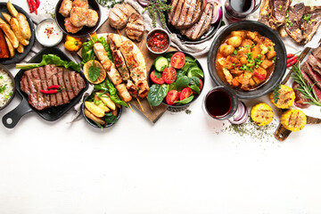 Meat dishes. Plates of various meat