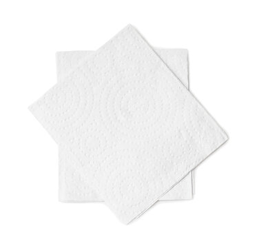 Two folded pieces of white tissue paper or napkin in stack tidily prepared for use in toilet or restroom isolated on white background with clipping path in png file format