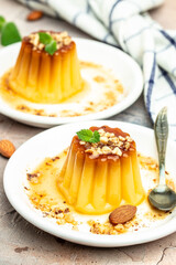 panna cota with caramel. Creme Caramel Dessert on a light background. vertical image. top view