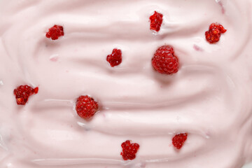 Pink Yogurt with raspberries. Curl of Yogurt. Pink nature yogurt, sour cream, ice cream. Delicious...
