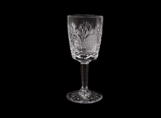 Handmade crystal liquor glass on a black