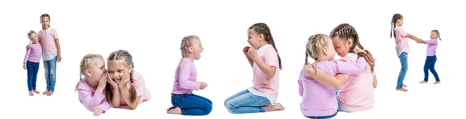 Friendship of little girls. Children in pink sweaters and jeans communicate, quarrel, laugh and hug. Collage, set. Isolated on white background. Panorama format.