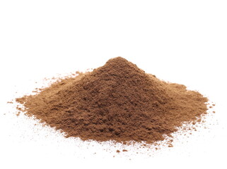 Pile ground, milled nutmeg powder isolated on white 