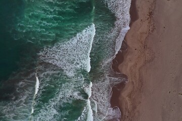 Waves breaking on a beach in California