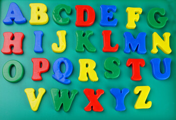 Colorful plastic alphabet letters isolated.