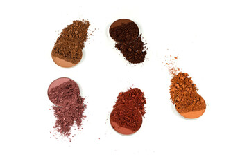 Eyeshadow crushed palette, colorful eye shadow powder isolated on a white background.