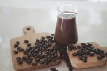 Hot coffee with coffee bean roasting. Close up
