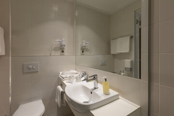 Bathroom interior with glass shower cabin